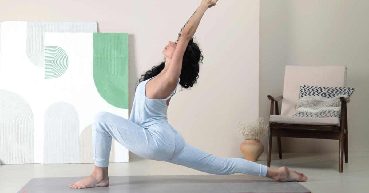Woman Stretching in Bed