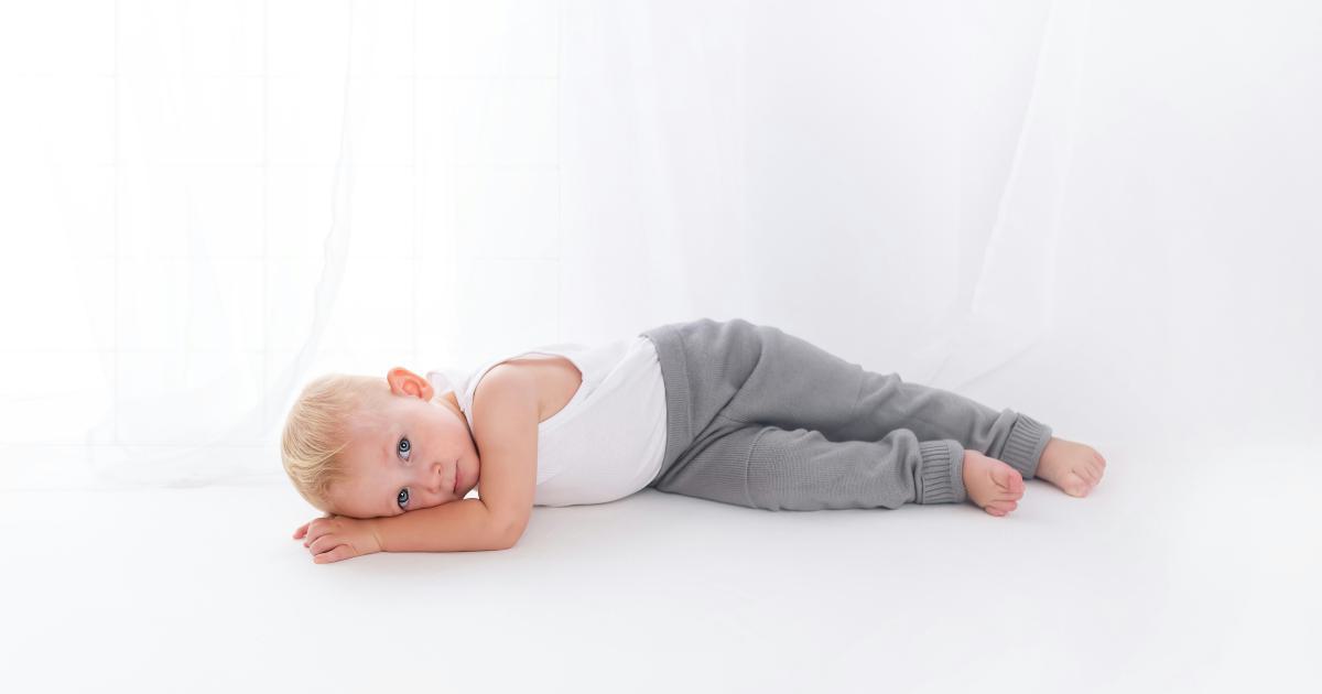 Baby Sleeping on Ergonomic Mattress Topper