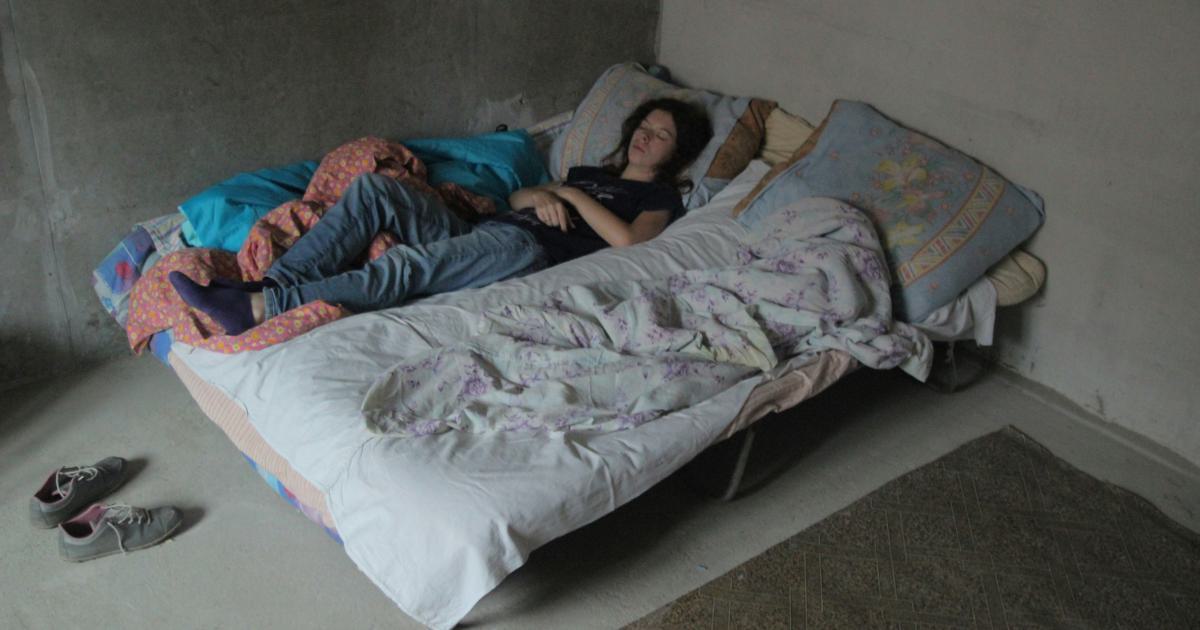 Personne endormie sur un matelas